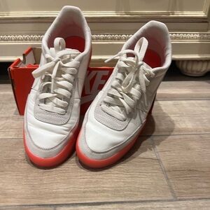 Nike Women’s White Sneakers with Orange Trim